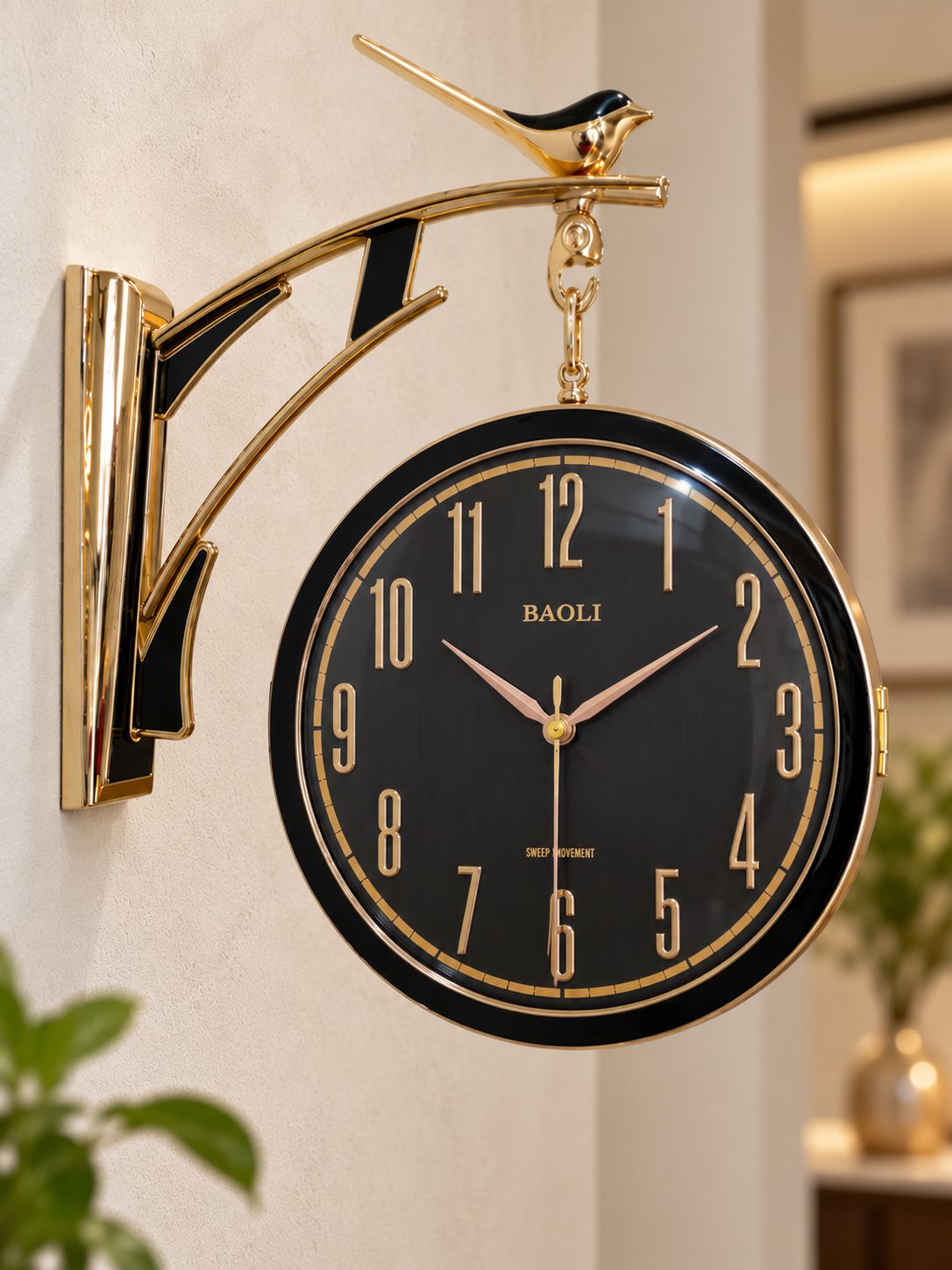 Black Sparrow dual-sided wall clock with Arabic numeral dial and gold accents