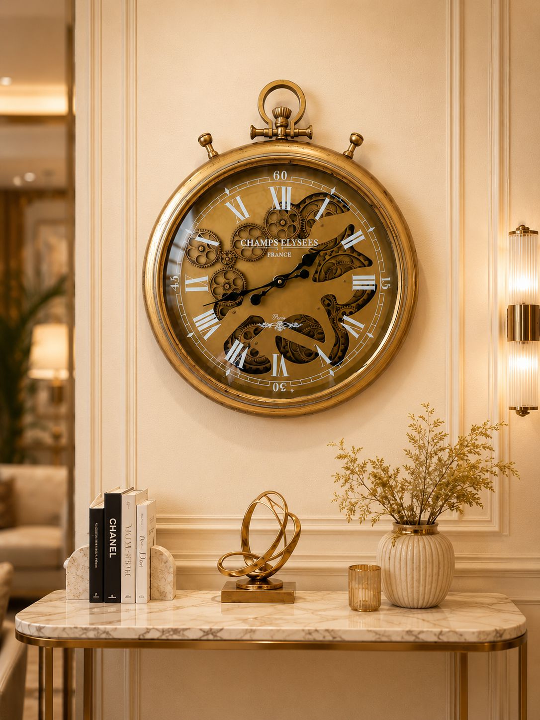 Decorative wall clock with Roman numerals on a marble console table in an elegant room.