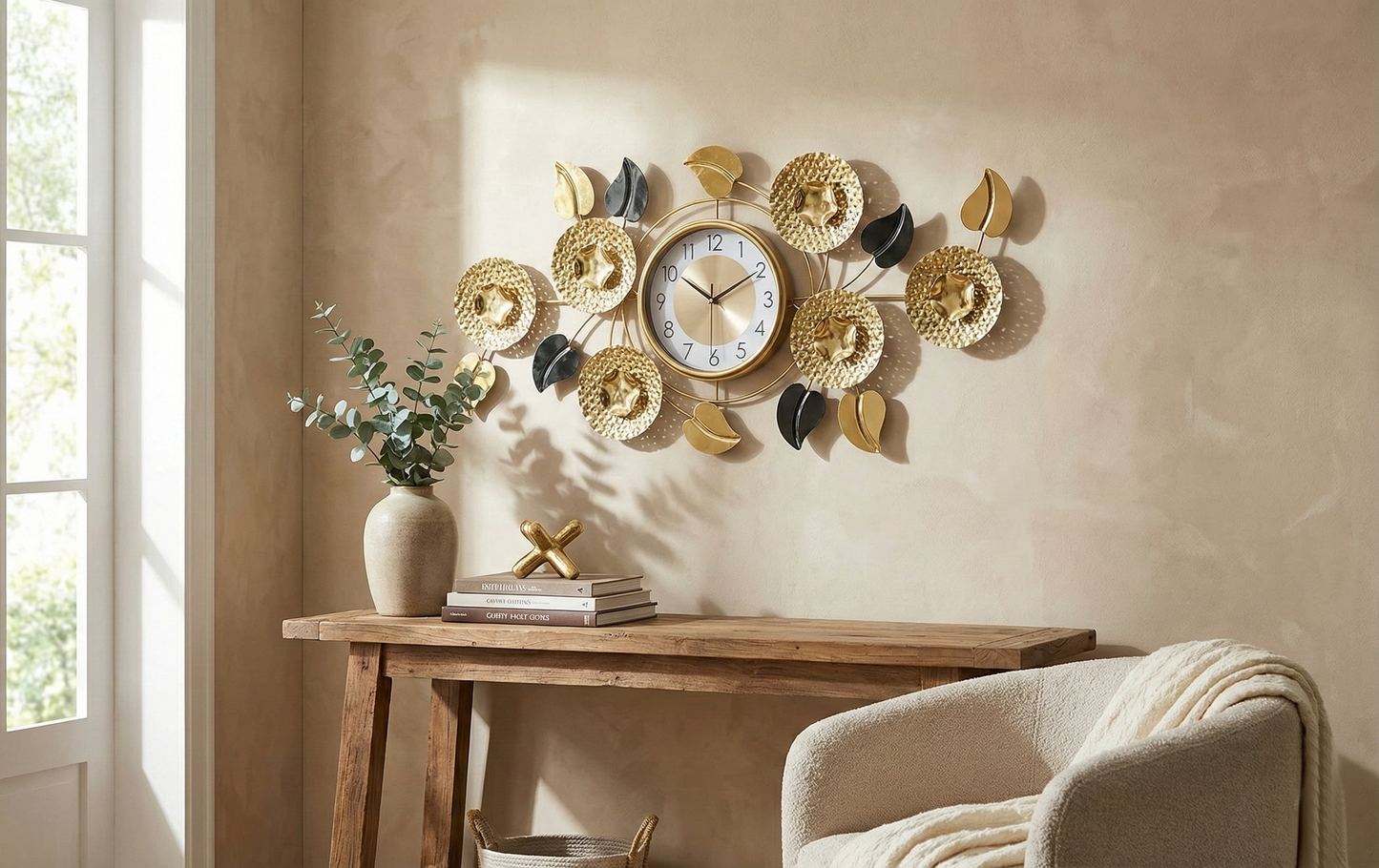 Decorative wall clock with floral designs on a beige wall above a wooden console table.