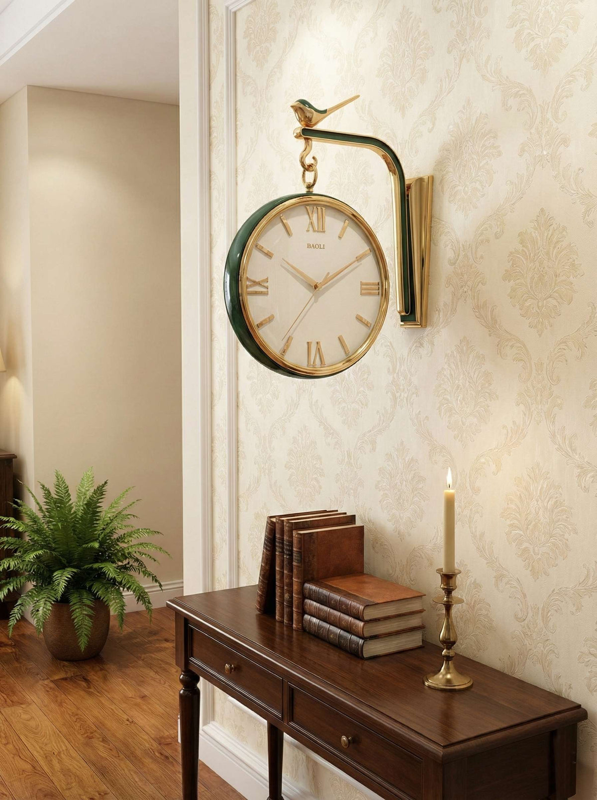 Decorative wall clock with gold accents on a wall above a wooden console table.