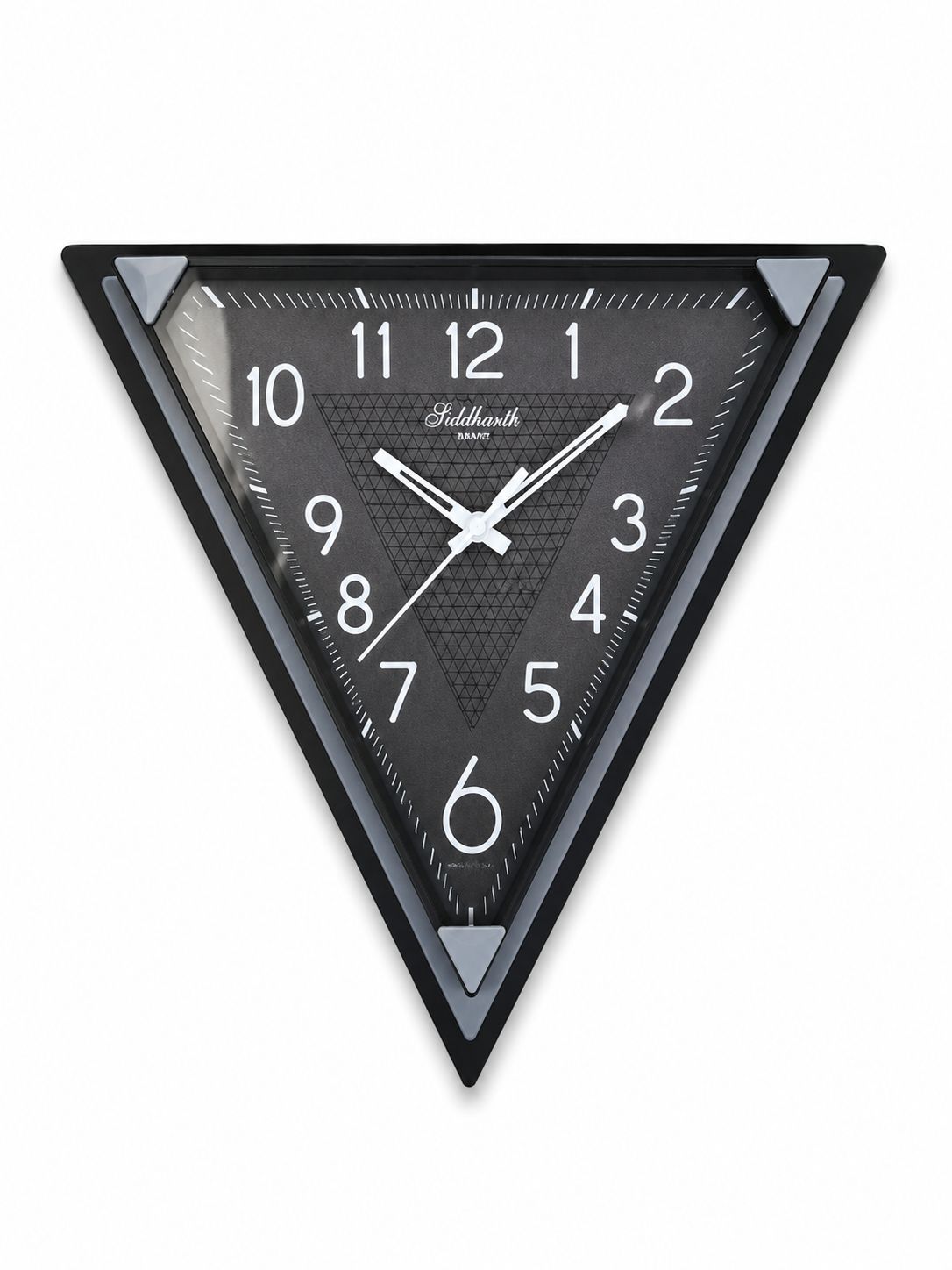A triangular wall clock with a black frame and a dark gray textured dial, featuring white Arabic numerals and hands, shown against a plain white background.