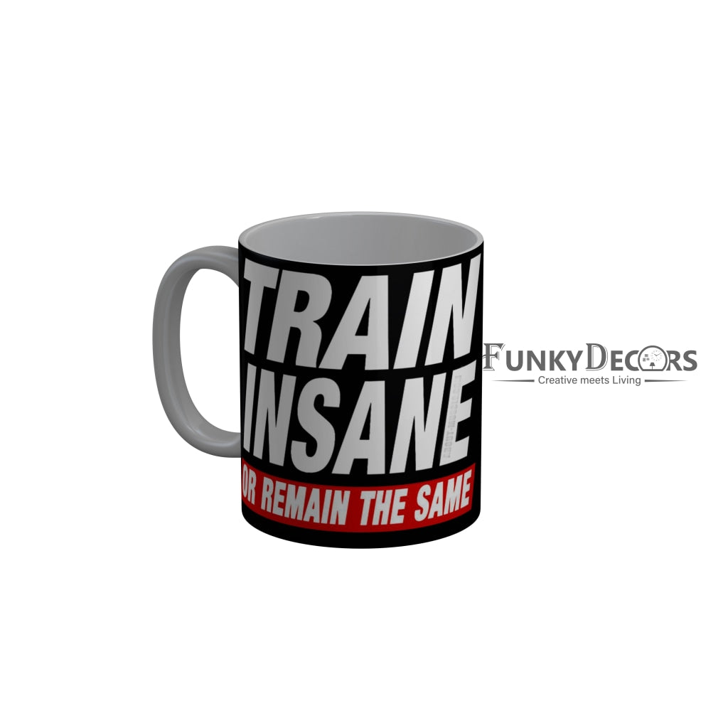 FunkyDecors Train Insane Or Remain The Same Black Funny Quotes Ceramic Coffee Mug, 350 ml