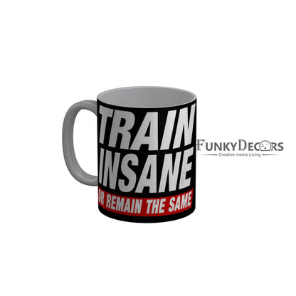 FunkyDecors Train Insane Or Remain The Same Black Funny Quotes Ceramic Coffee Mug, 350 ml