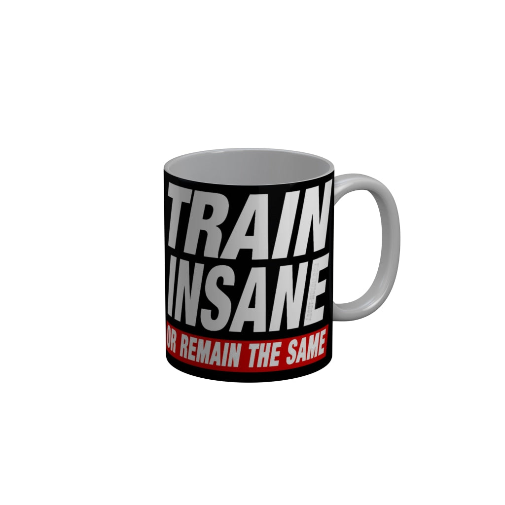FunkyDecors Train Insane Or Remain The Same Black Funny Quotes Ceramic Coffee Mug, 350 ml