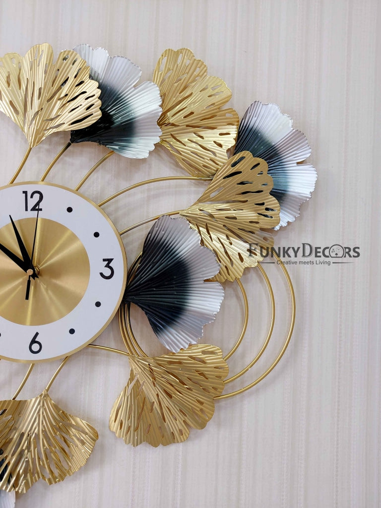 http://funkydecors.com/cdn/shop/products/funkytradition-modern-minimalist-creative-colorful-leaf-shape-metal-wall-clock-watch-decor-for-home-office-clocks-460_1200x1200.jpg?v=1671065985