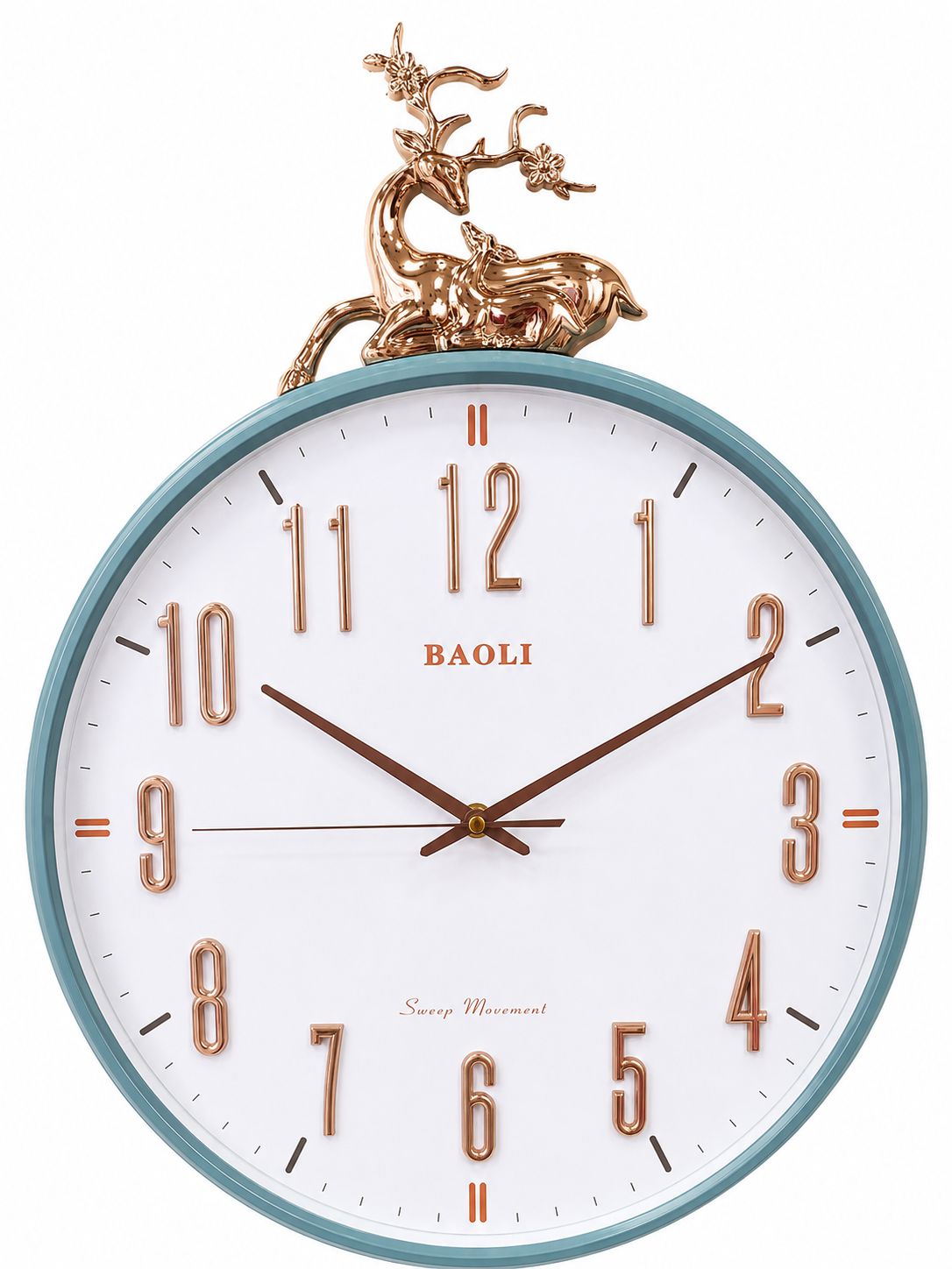 A round wall clock with a white face, a light blue rim, rose gold Arabic numerals and hands, and a metallic deer figurine on top. The brand name &