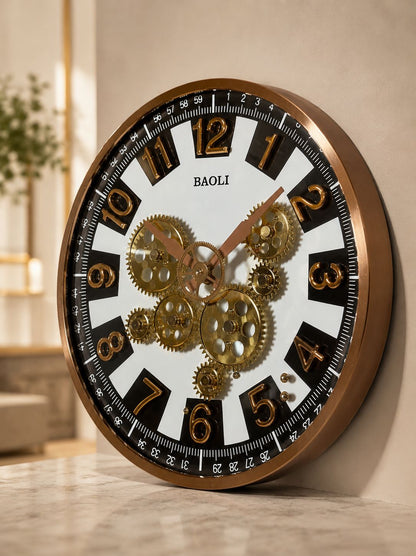 Angled perspective of black and gold moving gear wall clock with premium finish