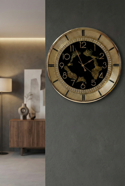 Decorative wall clock on a gray wall with a blurred room background