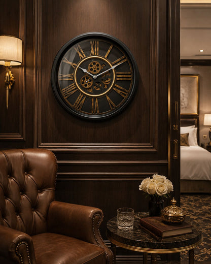 Decorative wall clock on a wooden wall with a brown armchair and table in the foreground.