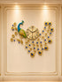 Decorative wall clock shaped like a peacock on a beige wall.