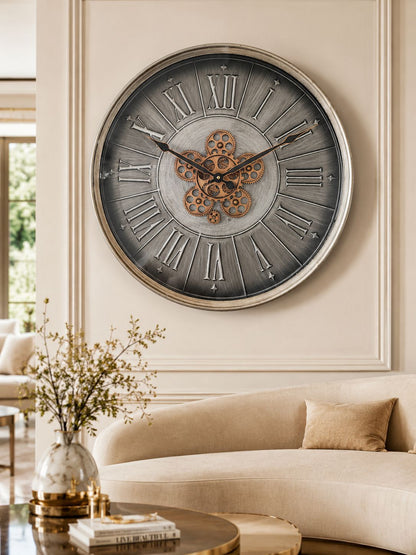 Decorative wall clock with Roman numerals in a living room setting