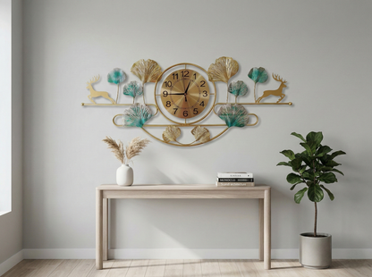 Decorative wall clock with floral and animal designs above a wooden console table with books and a plant.