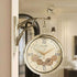 Decorative wall clock with gear design and deer figurine on a blurred background