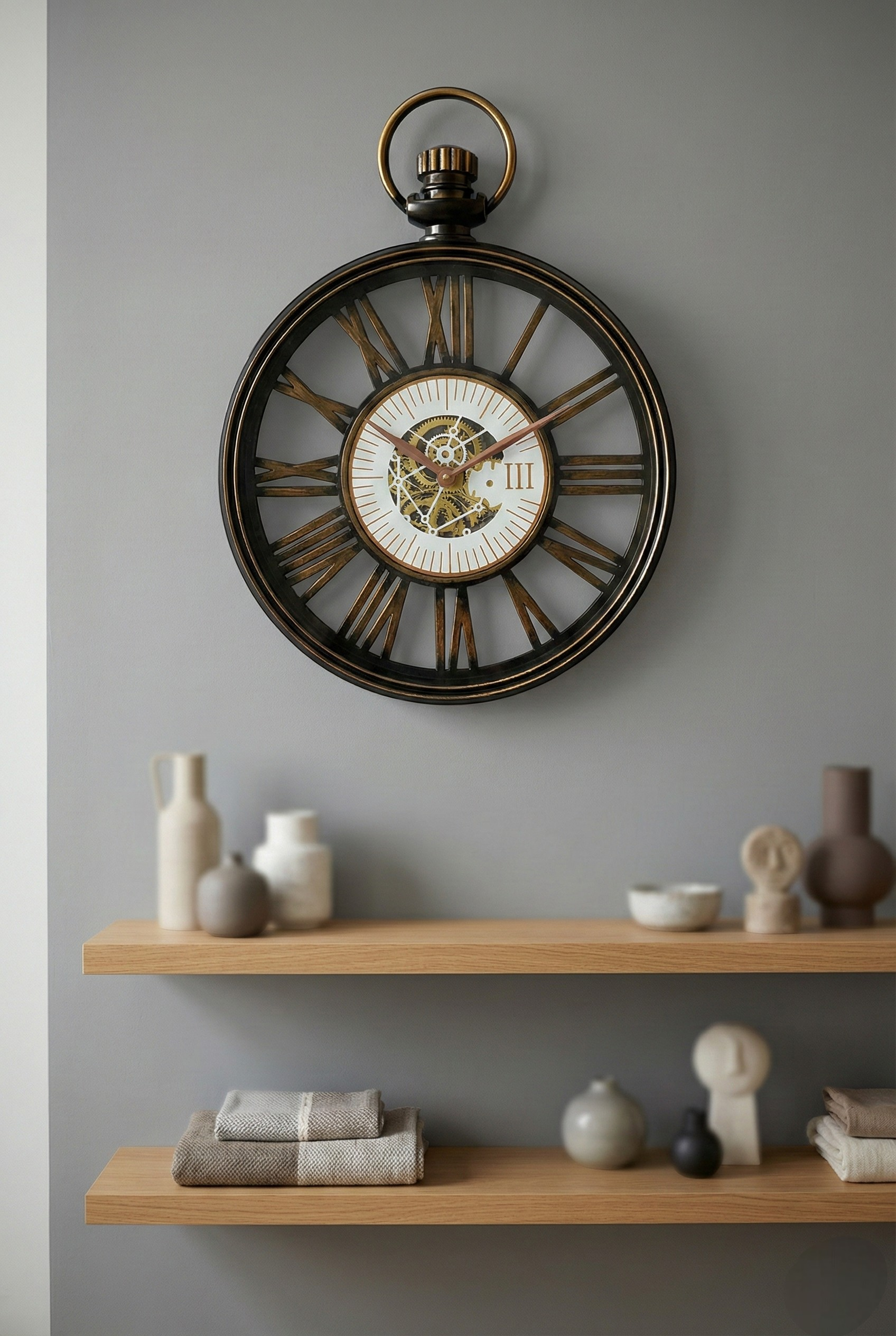 Decorative wall clock with wooden shelves and decorative items on a gray wall