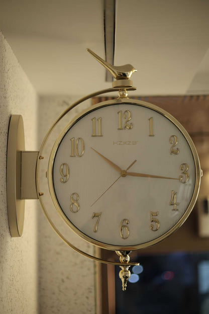 Double-sided deer wall clock mounted in modern living room