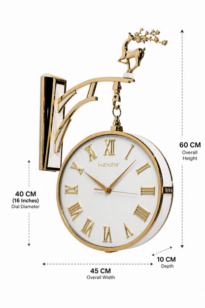 Gold wall-mounted decorative clock with a white face, Roman numerals, and a deer finial on a bracket, shown with dimension callouts for overall height, dial diameter, overall width, and depth.