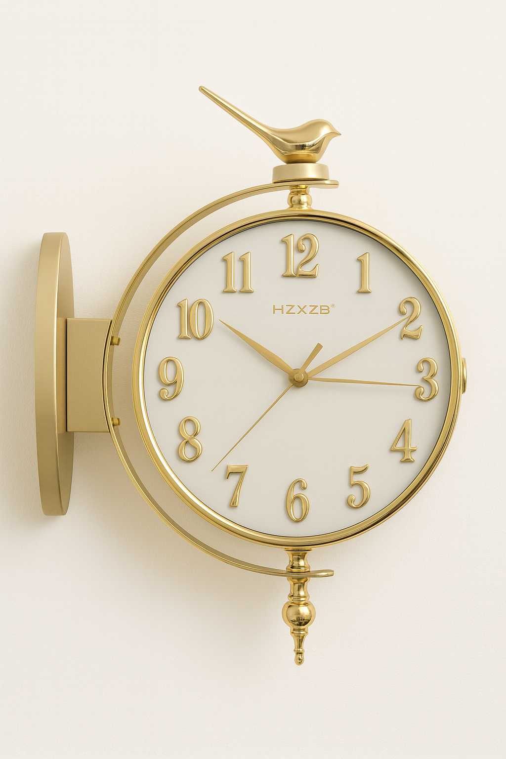 Gold wall clock with bird design on a white background