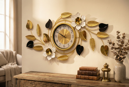 Large gold and black metal floral wall clock with white 3D flowers
