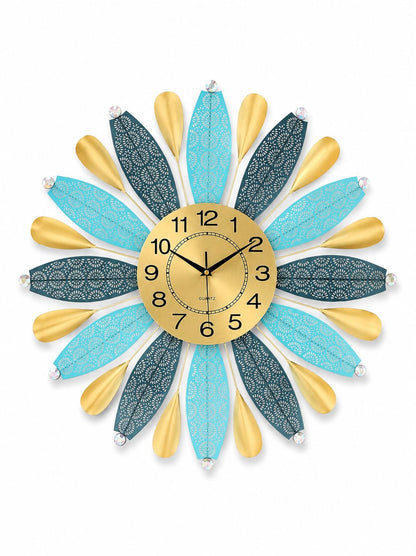 Luxury floral sunburst metal wall clock with turquoise and teal decorative leaves and crystal accents
