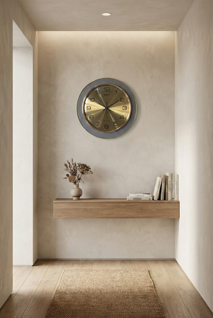 Modern interior with a wall clock, vase, and books on a wooden console against a beige wall.