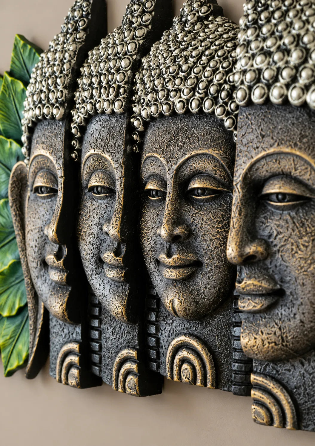 Five-Face Buddha Wall Art with Green Leaf Accents – Antique Stone Finish Decorative Wall Sculpture | FunkyTradition