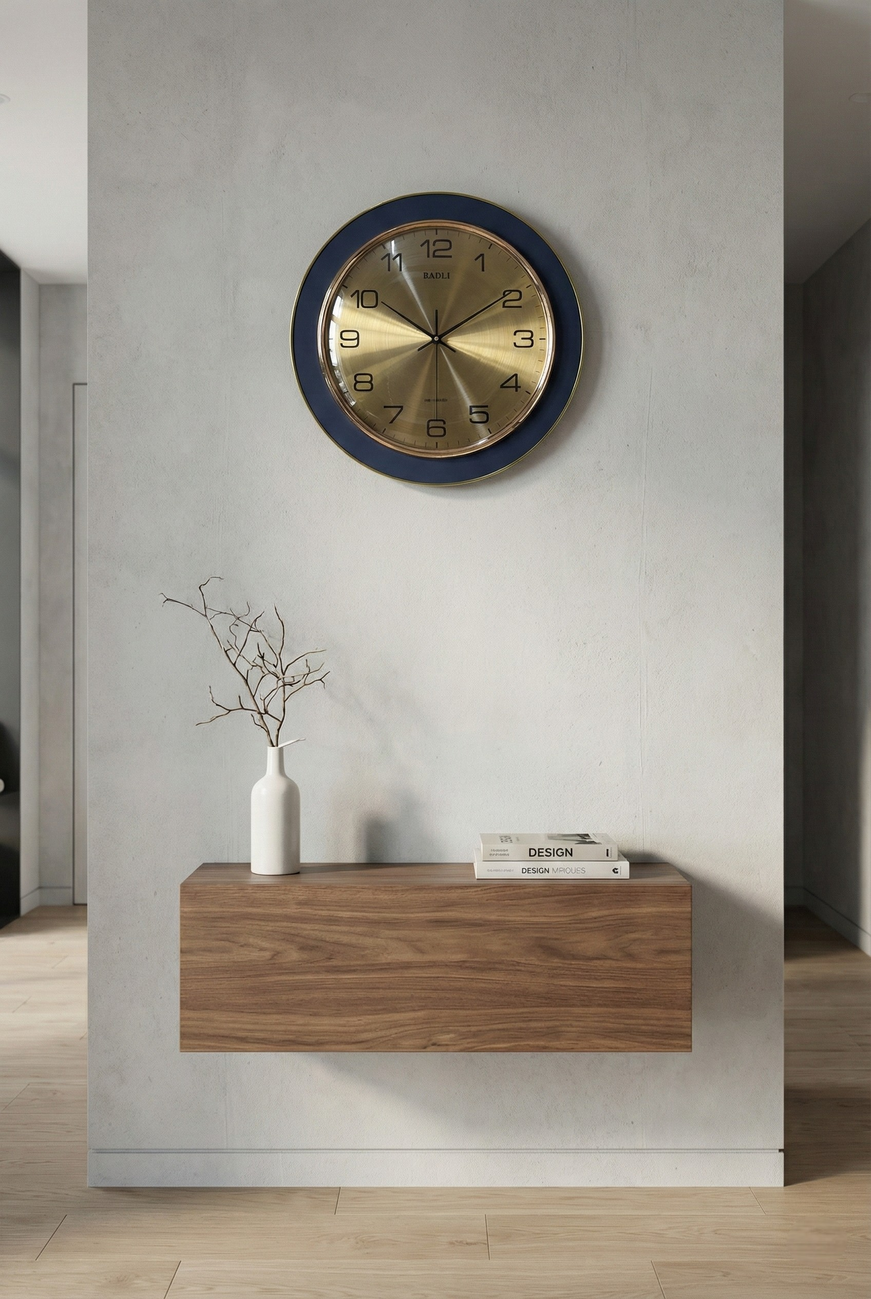 Wall clock with blue frame and gold face on a white wall above a wooden console table.