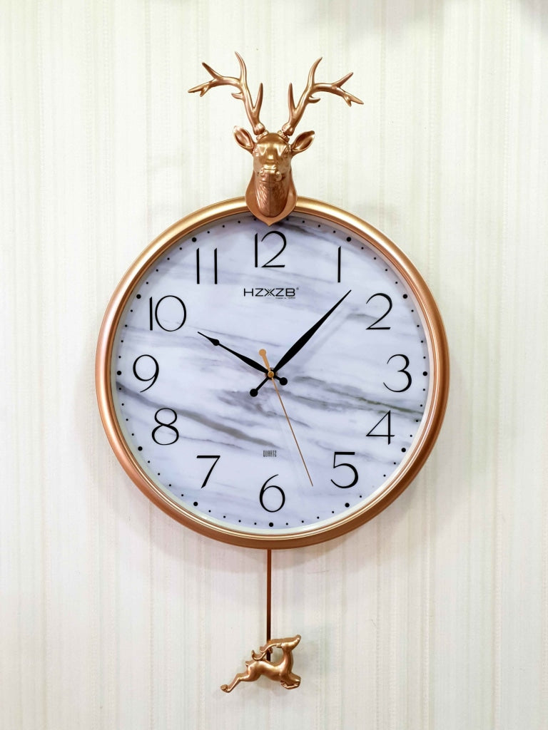 FunkyDecors Rose Golden Reindeer Pendulum Wall Clock For Home Office Decor And Gifts 68 Cm Tall
