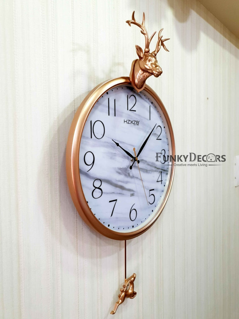 FunkyDecors Rose Golden Reindeer Pendulum Wall Clock For Home Office Decor And Gifts 68 Cm Tall